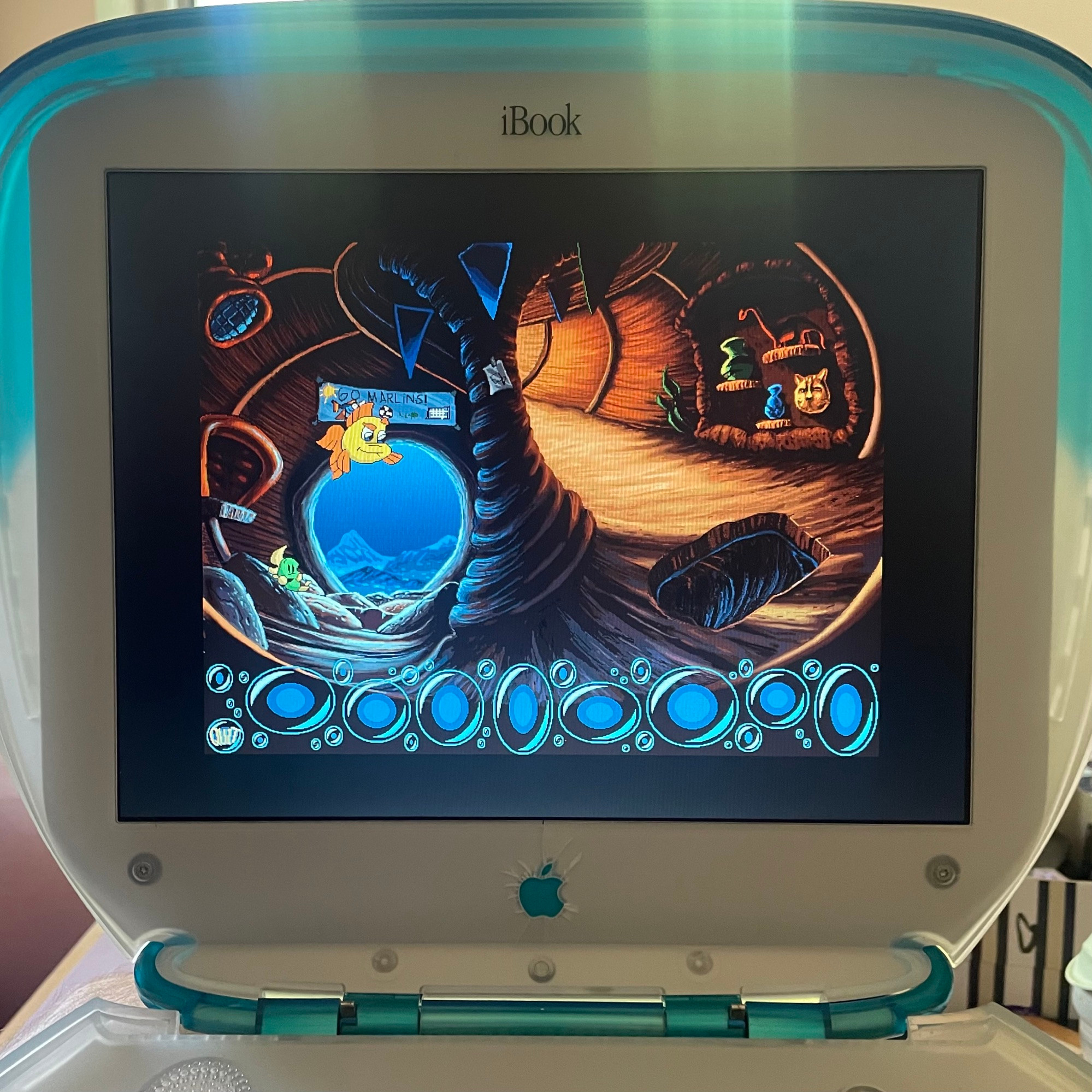 Freddi and Luther embarking on a new adventure through the haunted schoolhouse. This photo shows the inventory bubbles at the bottom of the screen. We hadn't picked anything up yet, but it notably has pre-set positions in the UI for each item you can collect. 