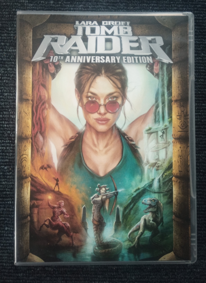 The front of the Lara Croft Tomb Raider 10th Anniversary Edition DVD case, featuring professional artwork of classic Lara Croft and great moments from the game.