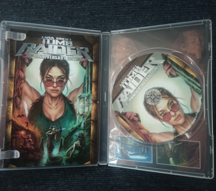Inside the DVD case, there's a printed manual on the left and a DVD on the right